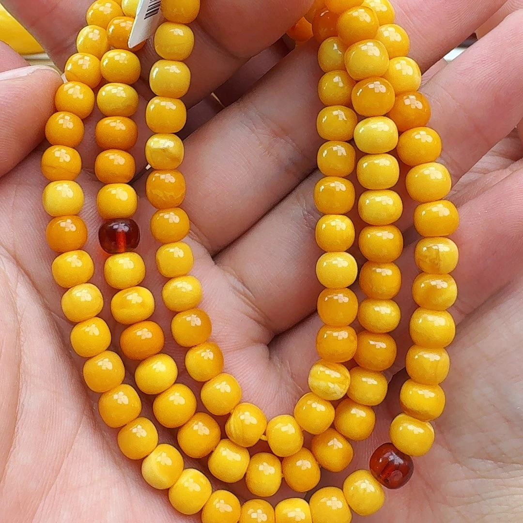 蜜蜡未镶嵌颈饰假一赔十，00