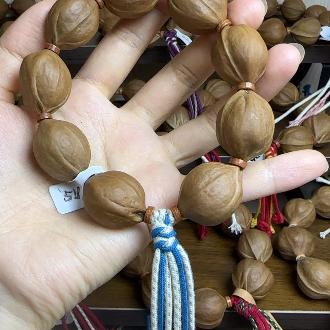 .***…手串橄榄核梅林铁核三花鲨鱼背2026