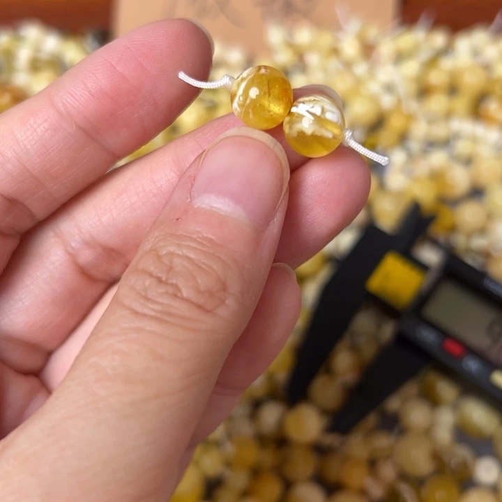 蜜蜡未镶嵌裸石9mm一对