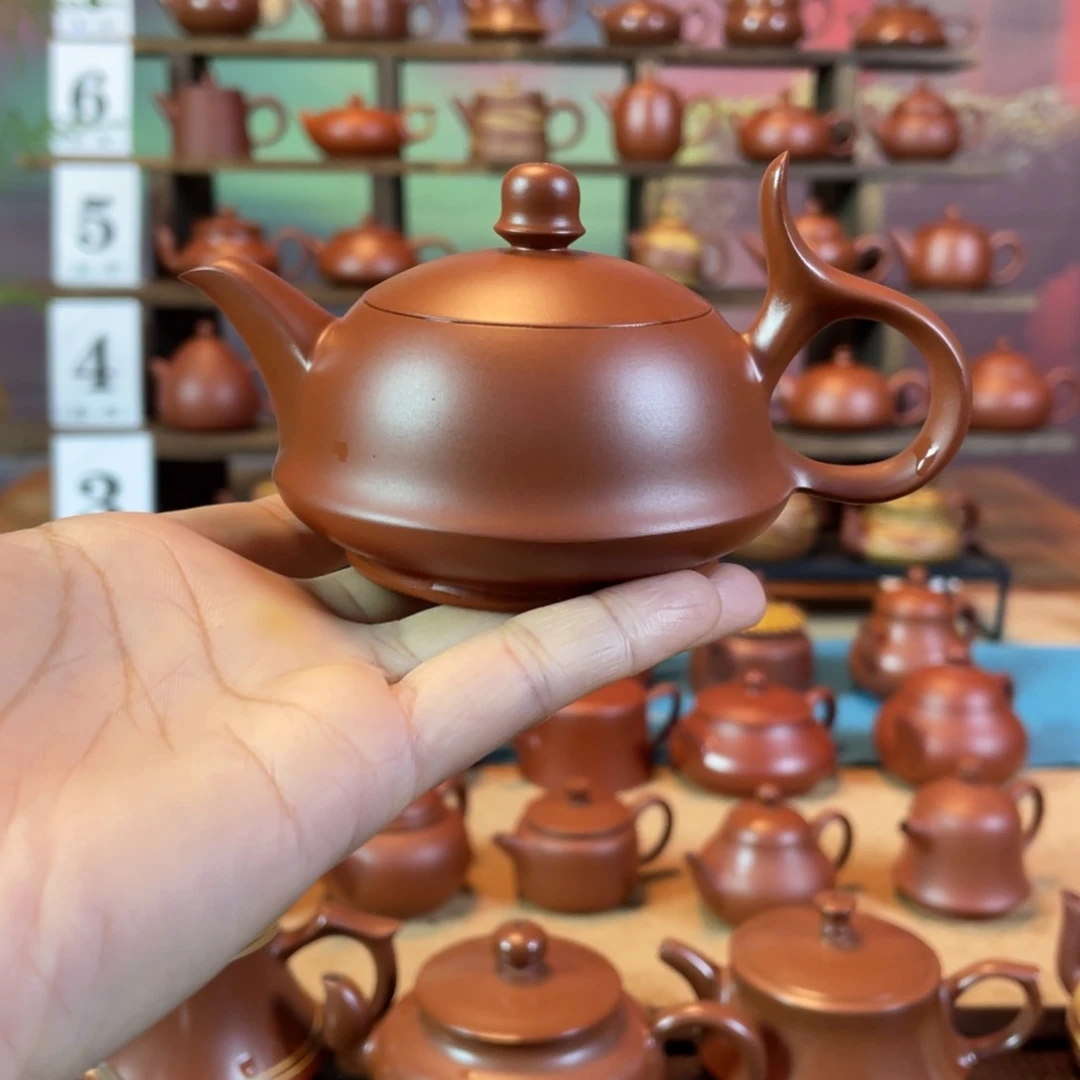 茶壶紫砂哎***害潮州手工手拉朱泥将军壶