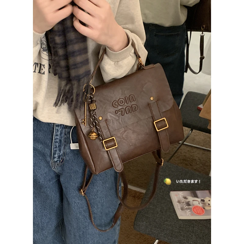 早秋复古手提公文包包女2025新款时尚韩版双肩包学院风大容量背包