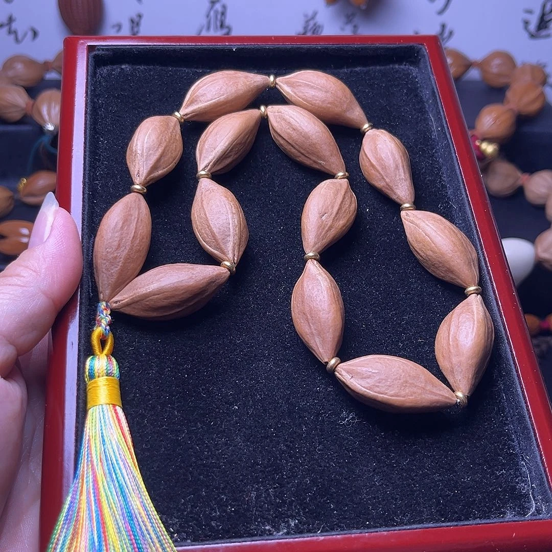 吊坠橄榄核水晶核手持15尺微微瑕疵