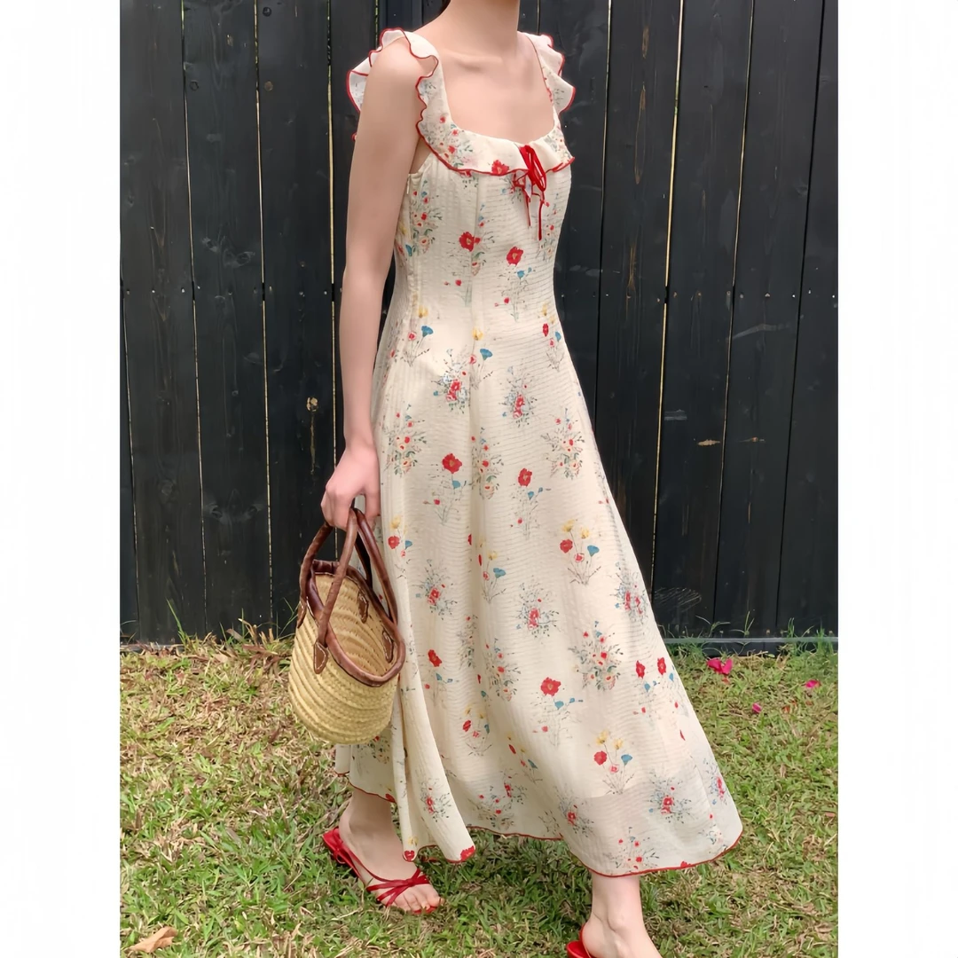 网红洋气穿搭夏款2025夏季茶歇吊带裙性感绝美无袖碎花连衣裙