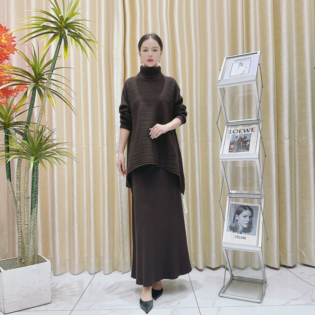 A135咖色设计气质秋冬长款提花轻奢针织两件套