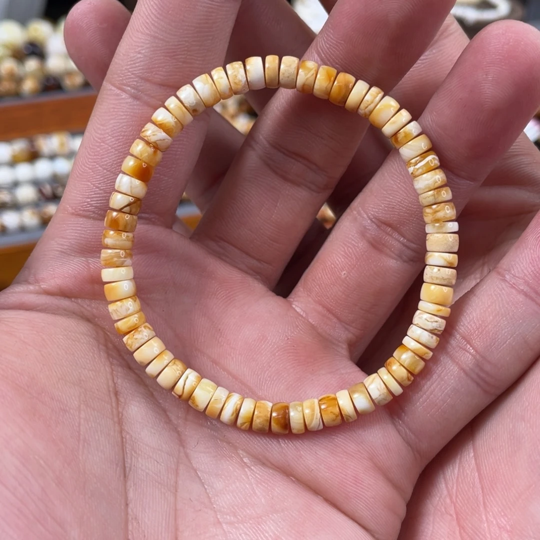 琥珀未镶嵌珠宝奇石5.5mm白底橘药片