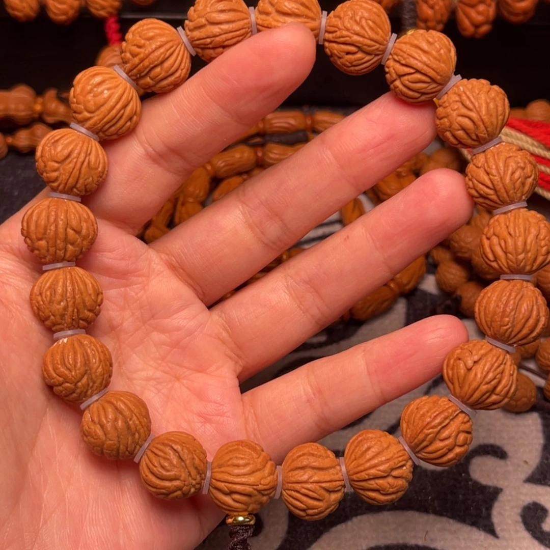 桃核手串龙纹甲骨14手持