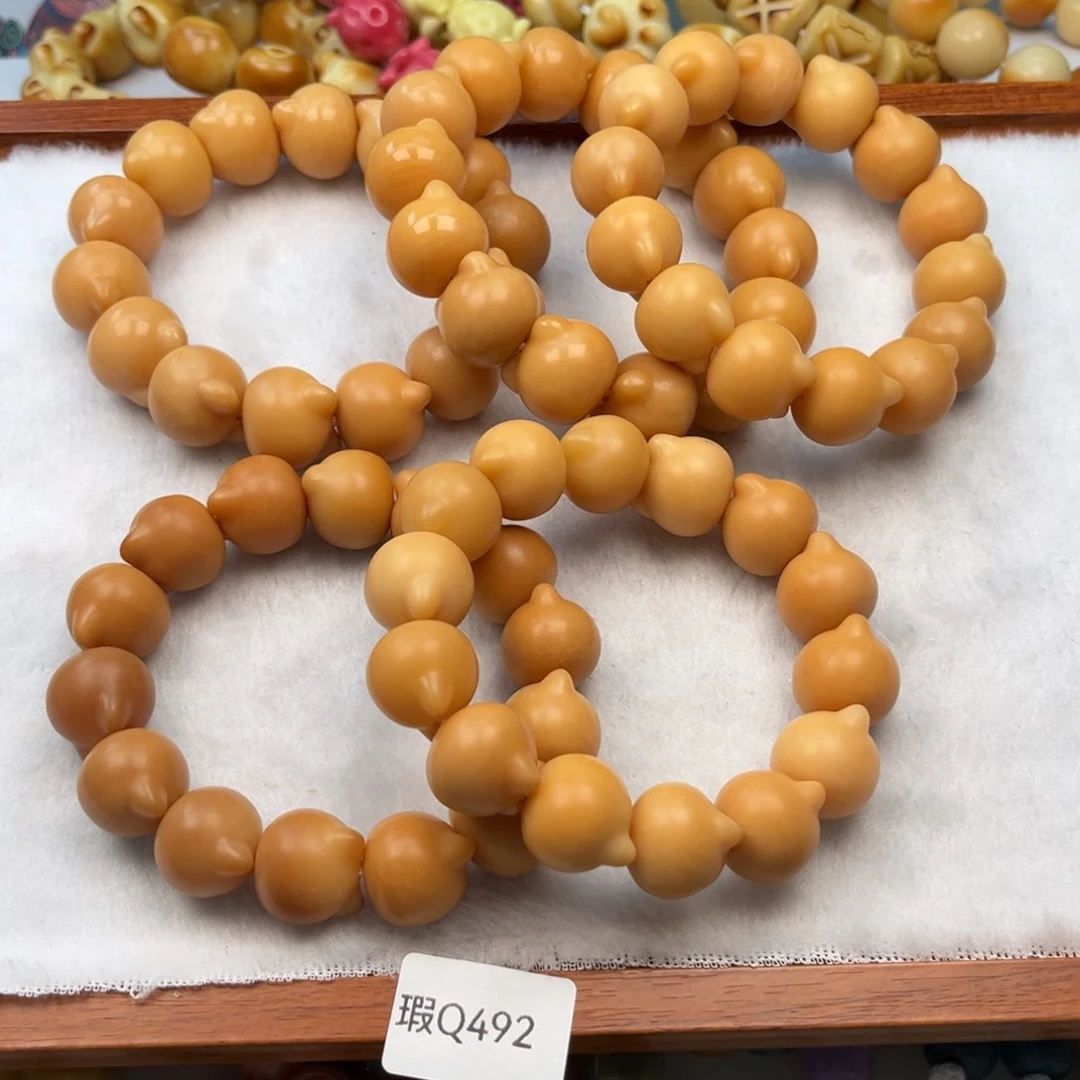 菩提根/象牙果手串瑕q492猫头随机一串19-20mm