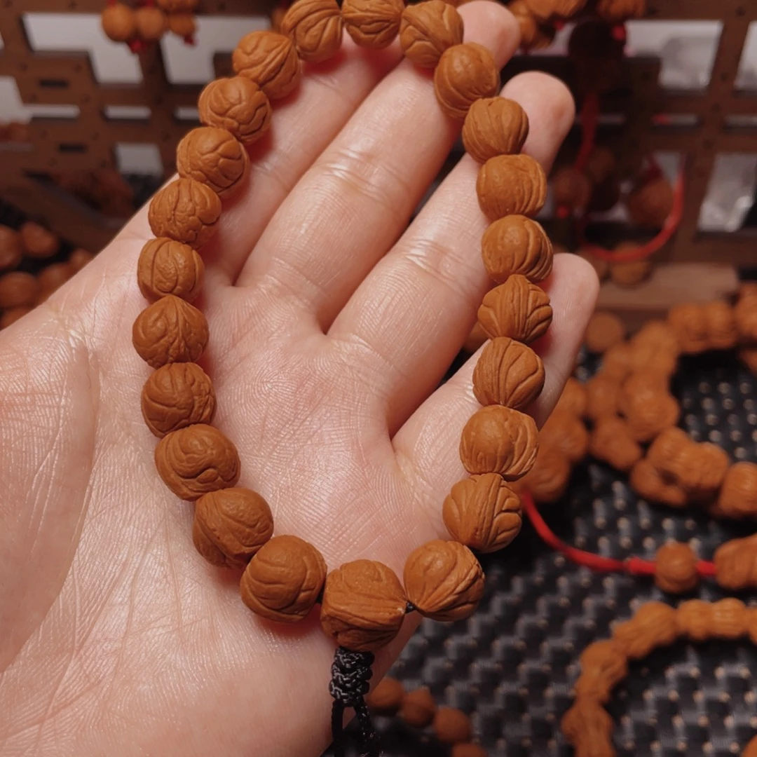 木质类龙纹桃枭手持