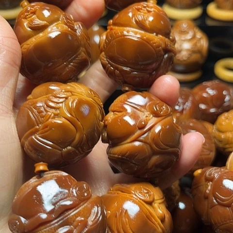 吕***浩橄榄核手串/手链嘟嘟财神580