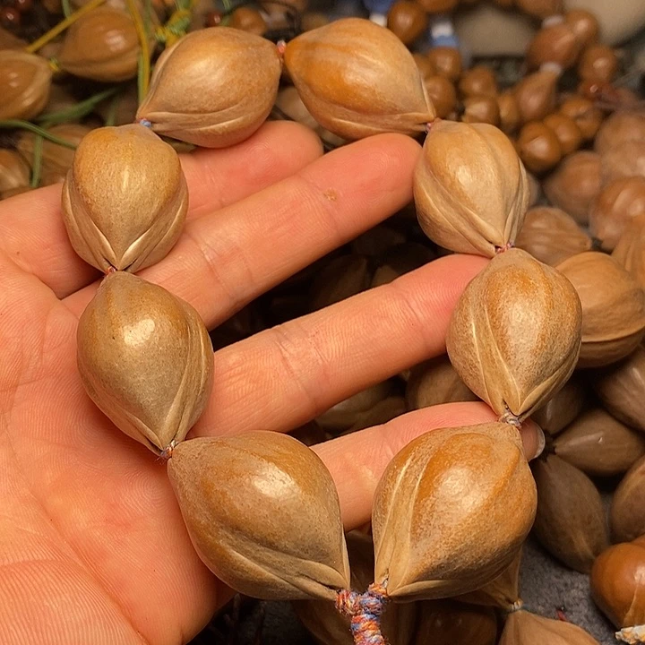 橄榄核手串三面佛手持13