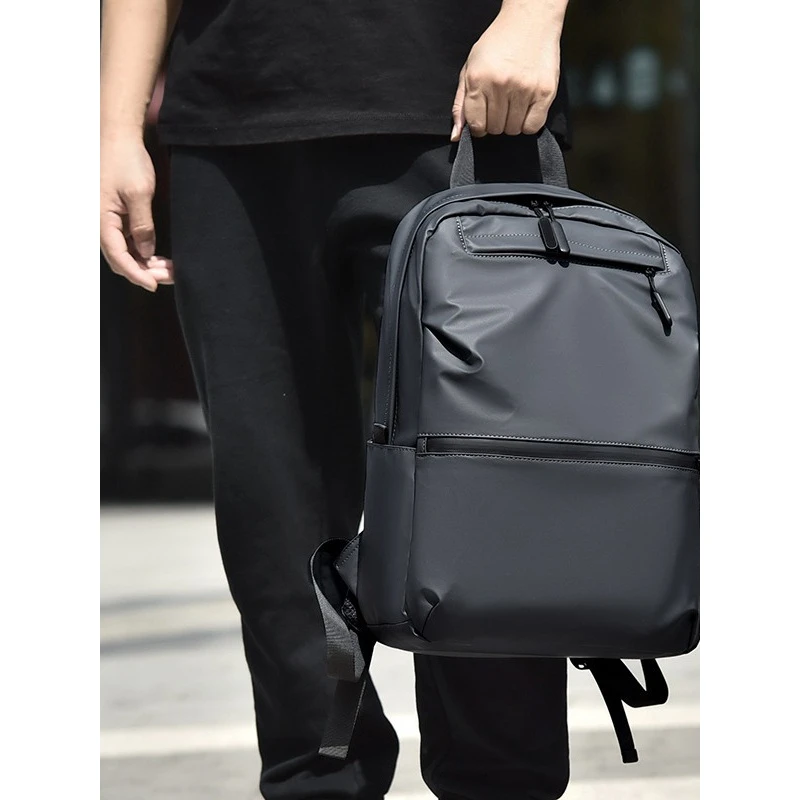 双肩包新款简约百搭时尚拉链潮流商务包休闲皮膜背包