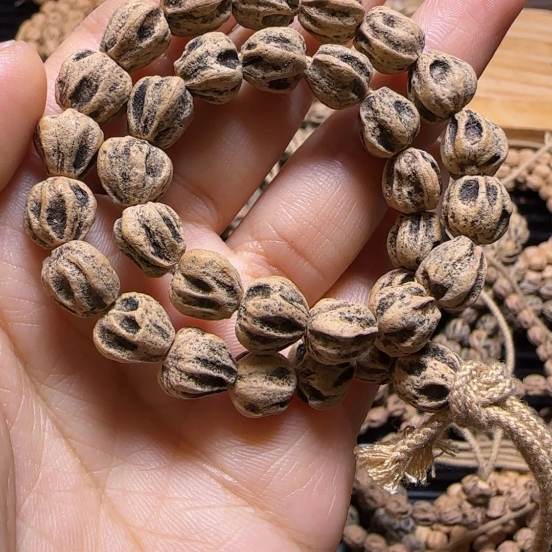 吊坠柏香籽/百香籽笑**云