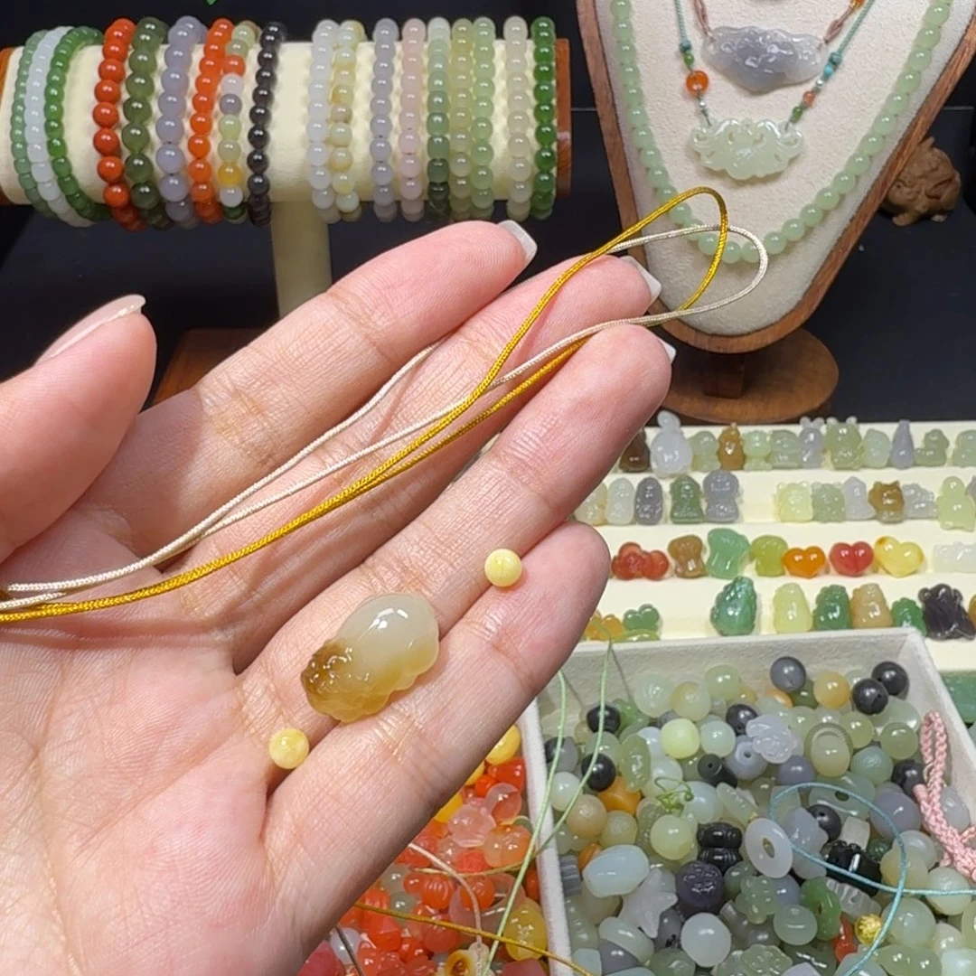 和田玉未镶嵌珠宝半成品貔貅双色通孔手链证书