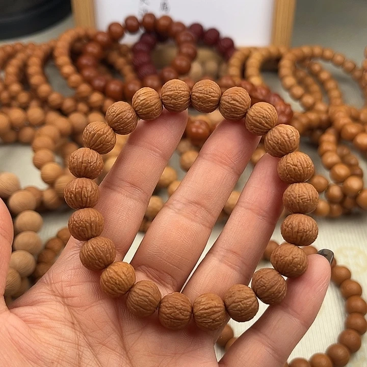 猴头核桃手串全品无暇原皮小凤羽