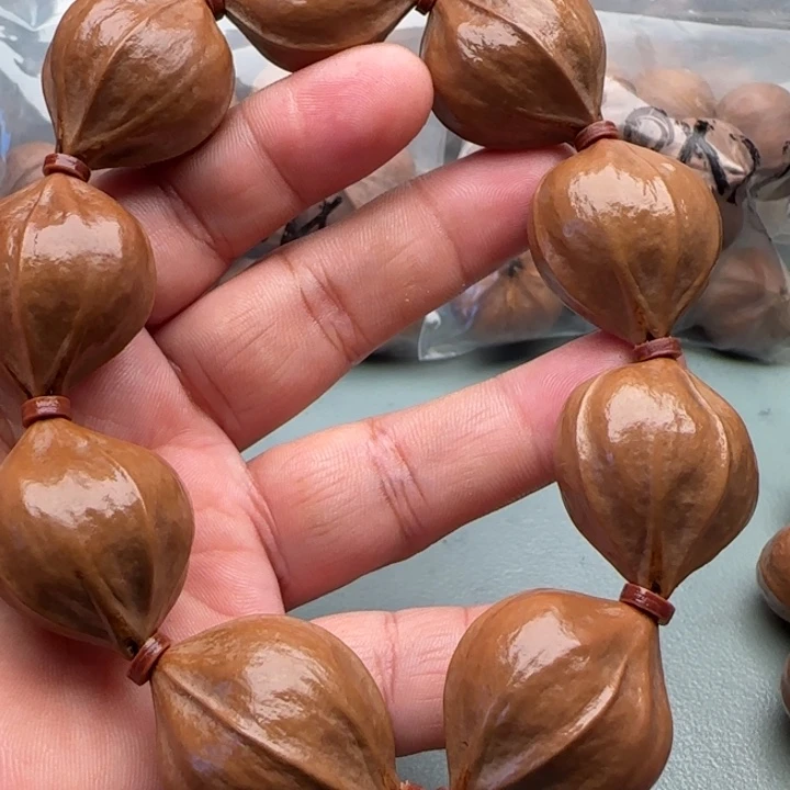 1***6橄榄核手串橄榄核原皮铁核四花