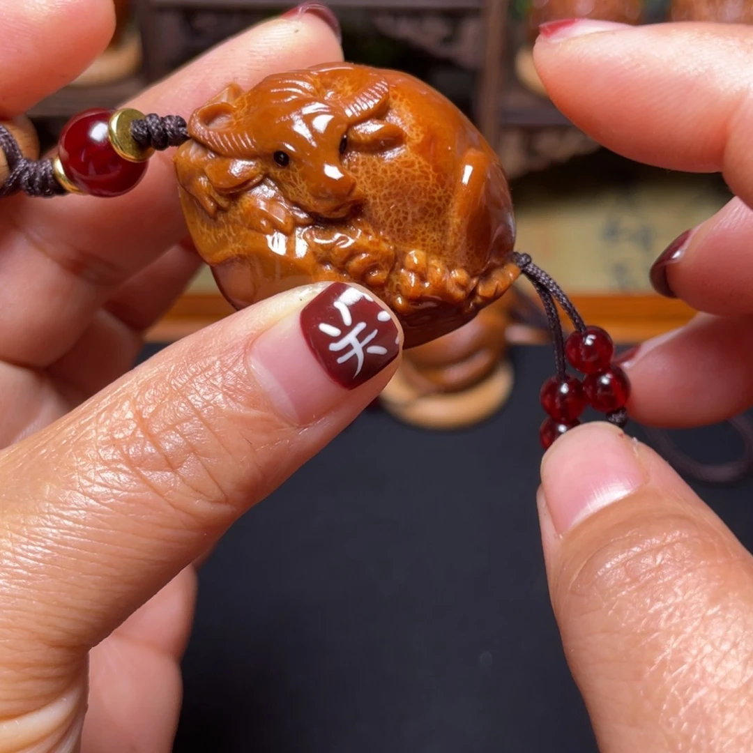 橄榄核吊坠牛掰穿配