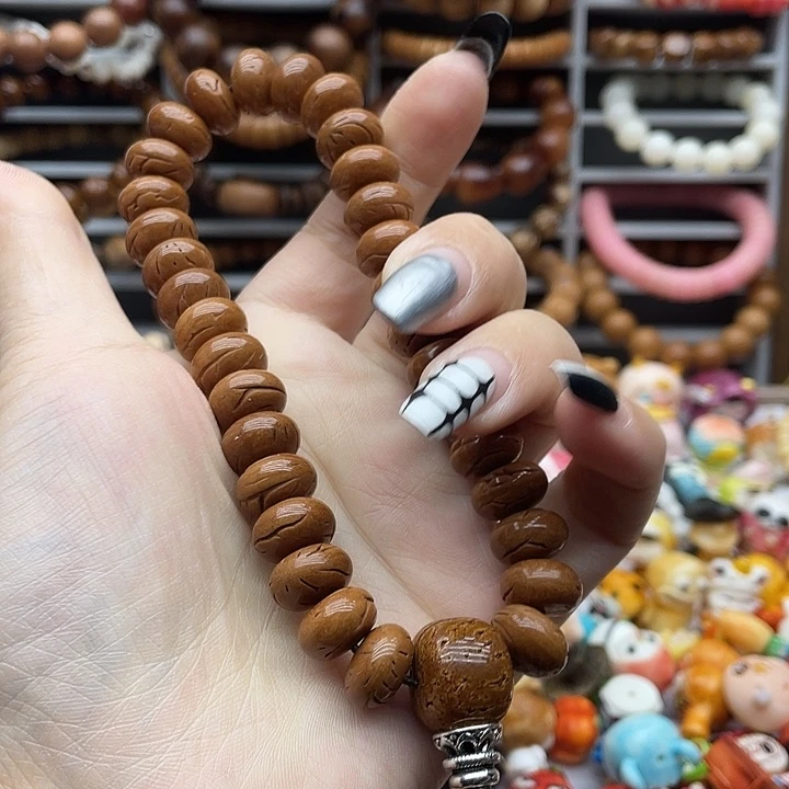 非金属手持一个素串