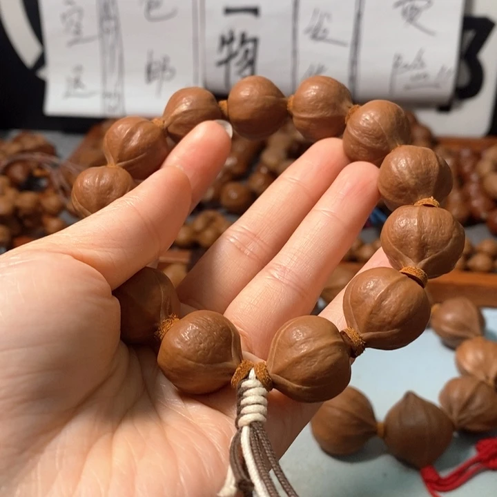橄榄核手串0281精品蒜头铁核12+1颗