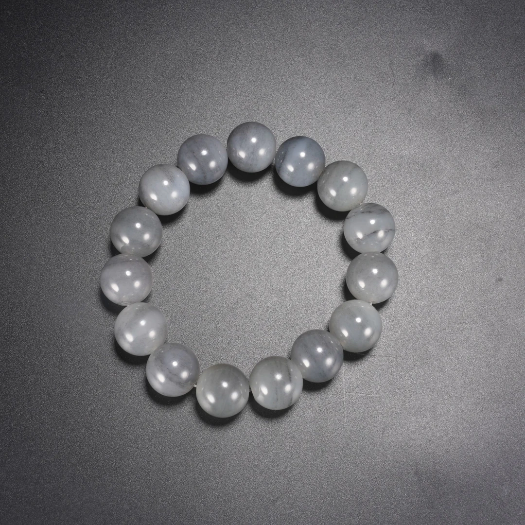 lot57新疆和田玉于田青花圆珠手串/保利拍卖