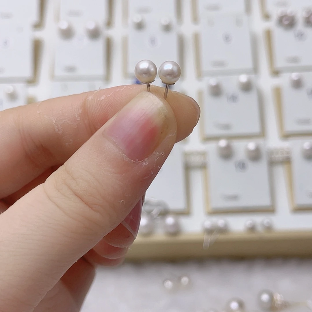 椰***盈银S925镶嵌淡水珍珠耳饰