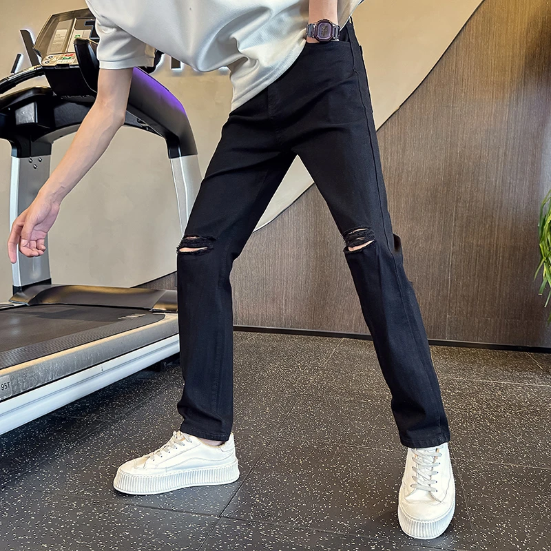 黑色微喇牛仔裤男痞帅修身破洞男裤2025新款夏季潮流百搭休闲裤子