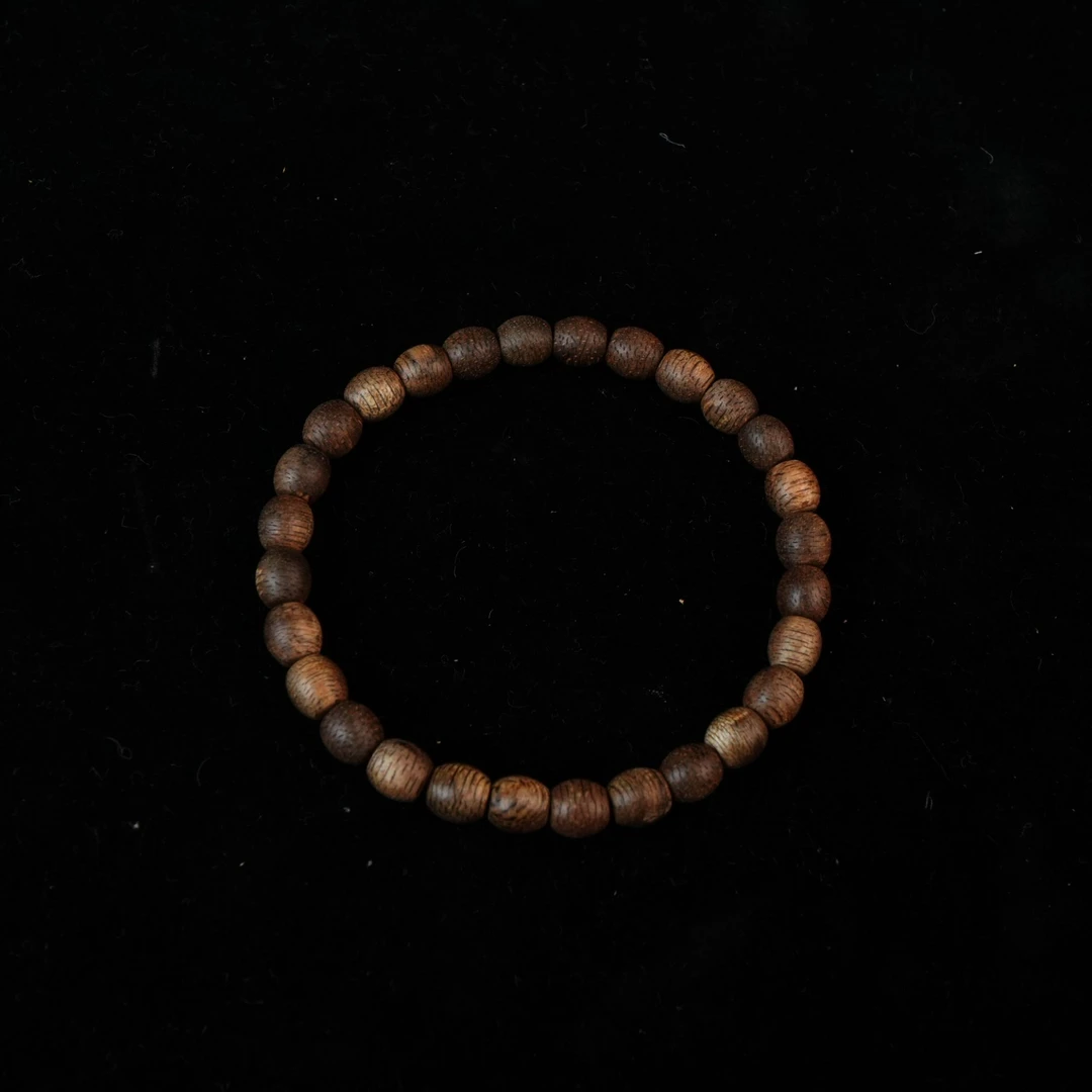 5089 东马沙捞越沉香软丝85分沉鼓珠 0.62x0.63cm  2.24g