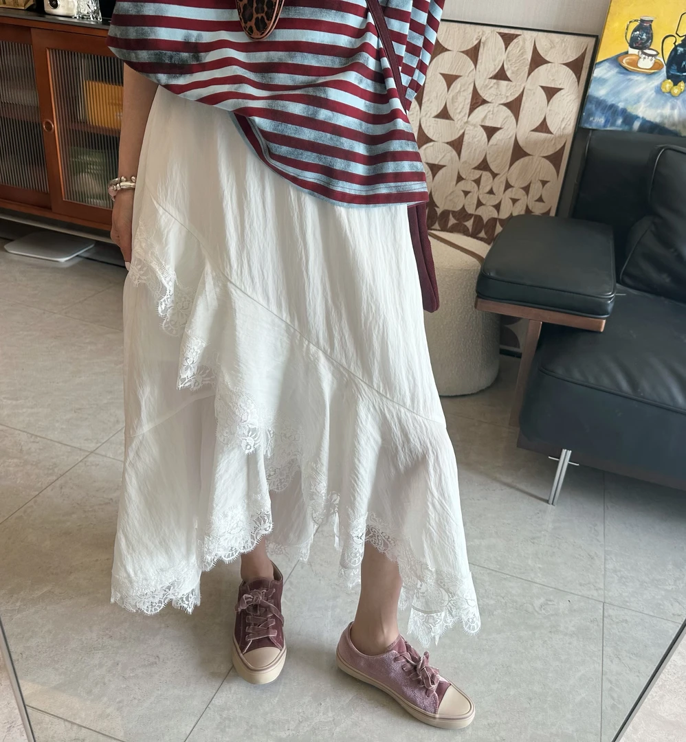 qiqi/琦琦推荐 韩版甜系蕾丝边不规则白色半身裙