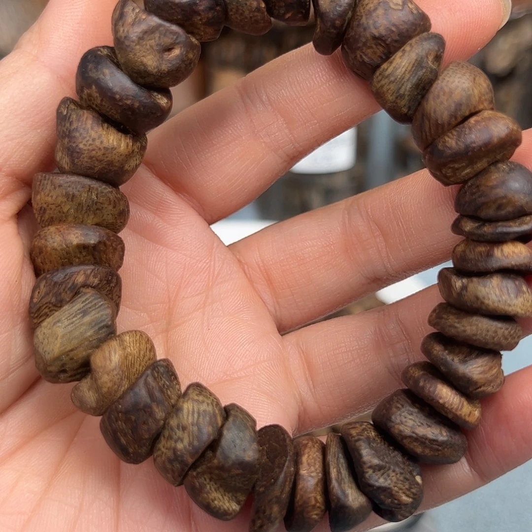 沉香木手把件老****赵奇楠张芍子树丁壳子手串一条21克