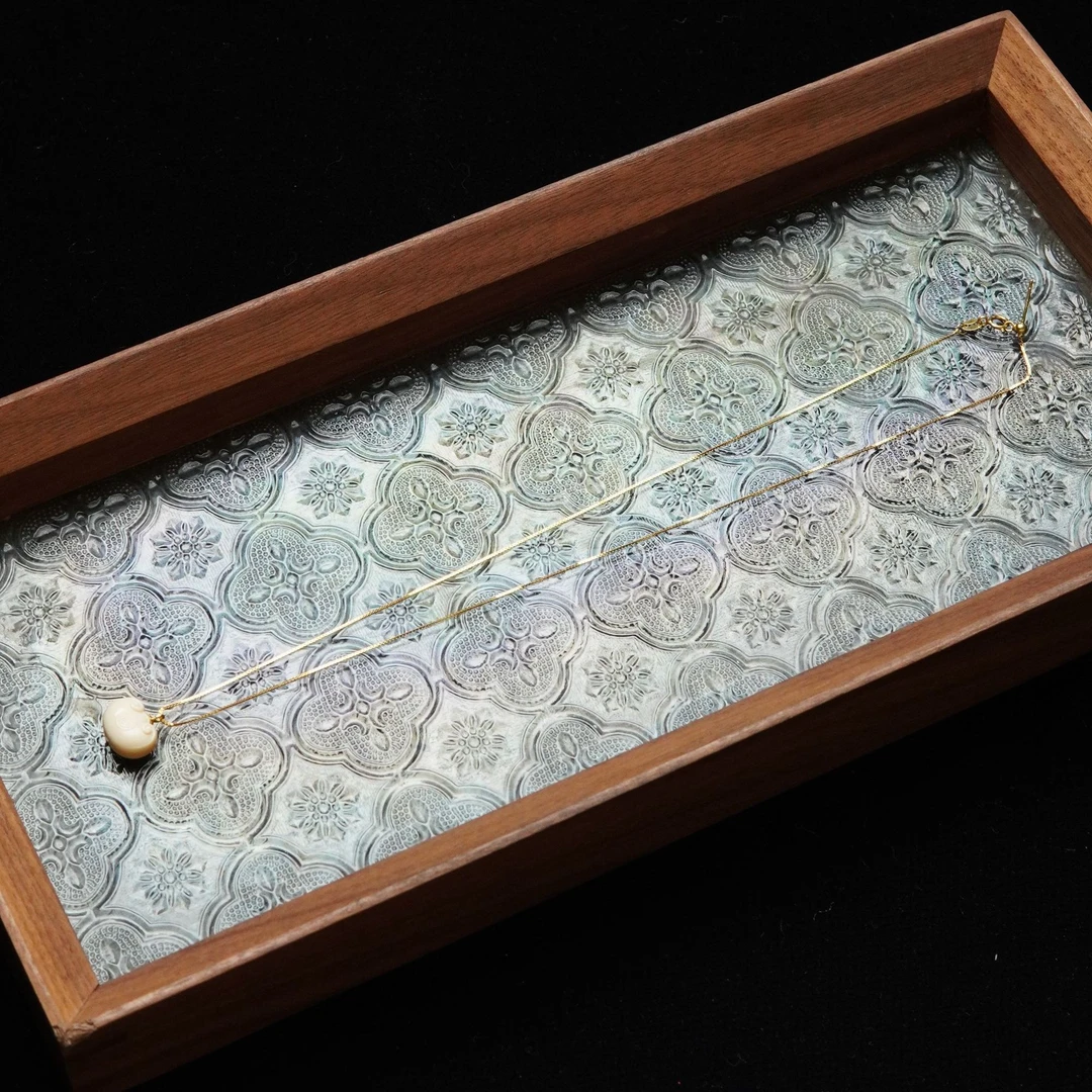 天然猛犸牙13*9*7mm雕刻福袋项链