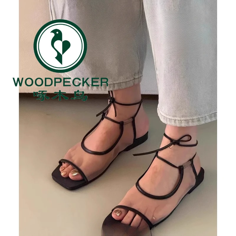 啄木鸟法式小众设计透气网纱平底舒适凉鞋女2025夏露趾绑带罗马鞋