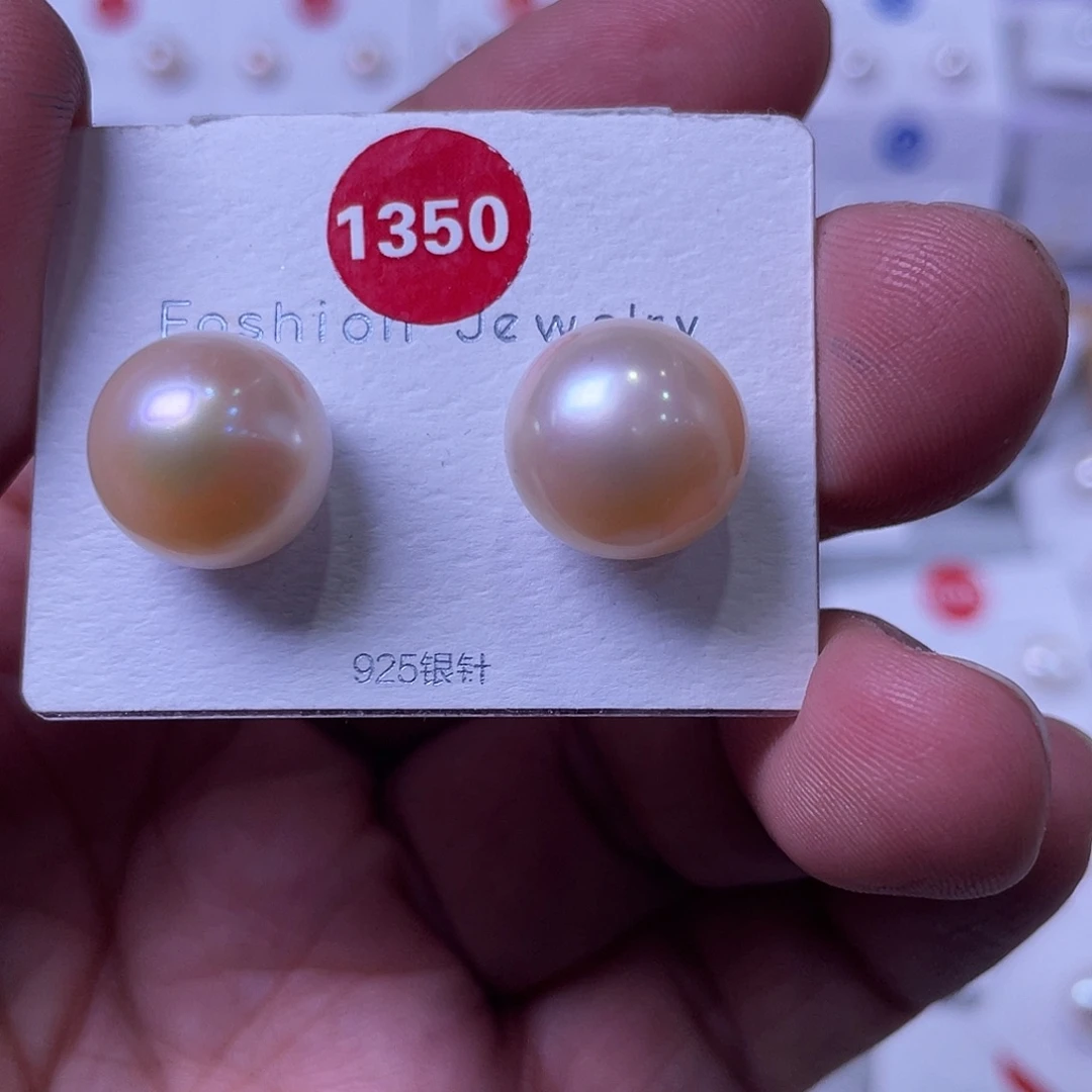 浅****淡水珍珠银S925镶嵌耳饰