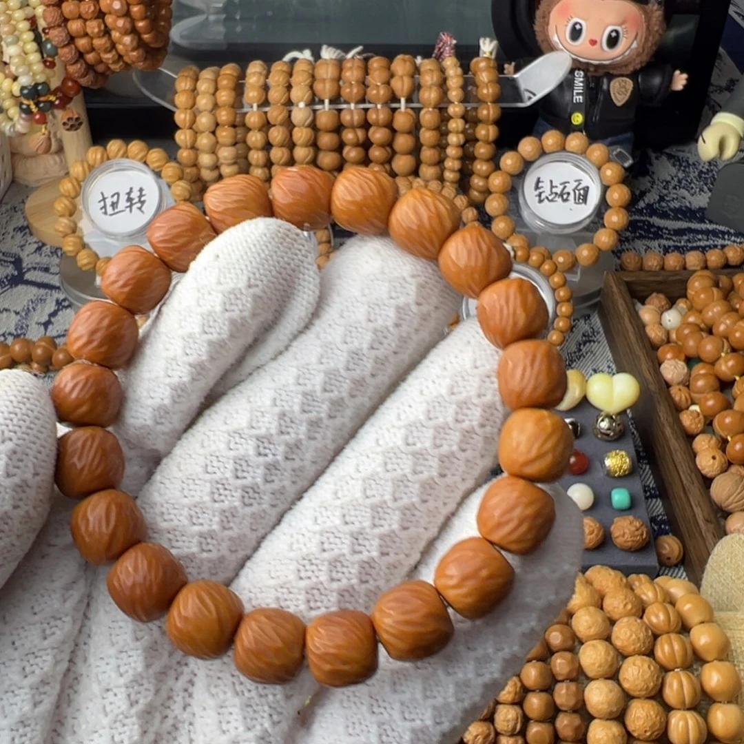 鱼***l猴头核桃手串云锦10m