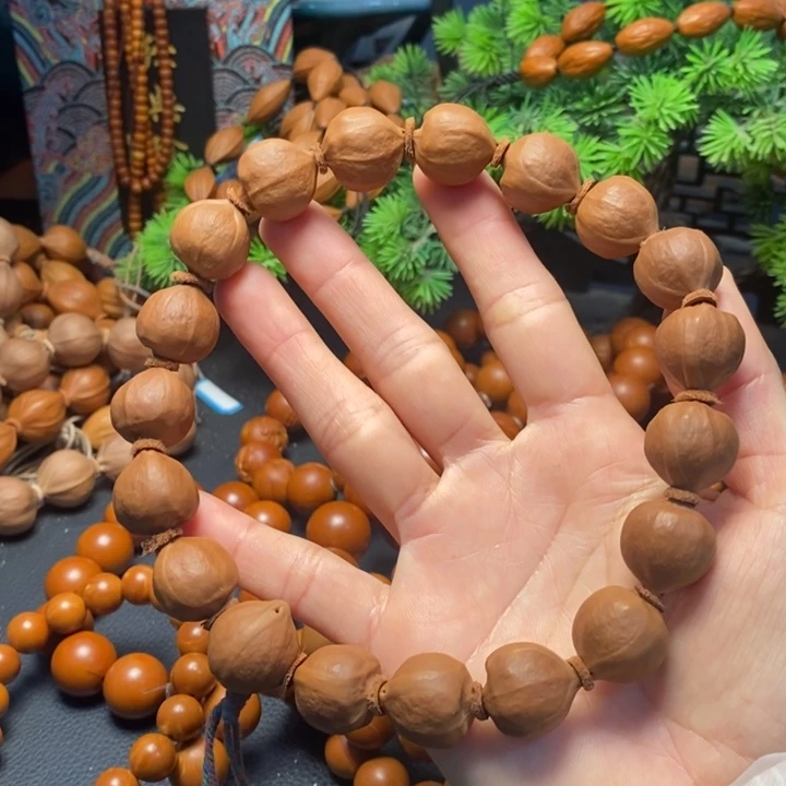 手串橄榄核1.7*1.9蜜桃臀