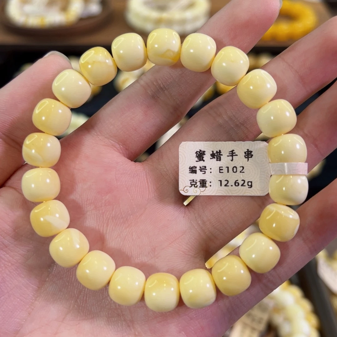 琥珀未镶嵌裸石10mm同料奶橘白老型手串