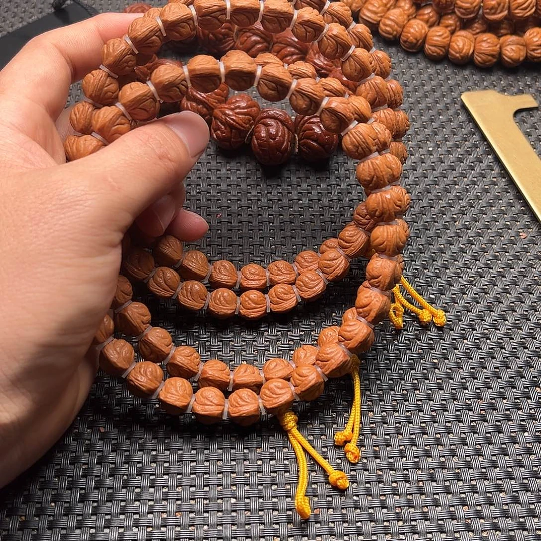 桃核吊坠小龙纹手持