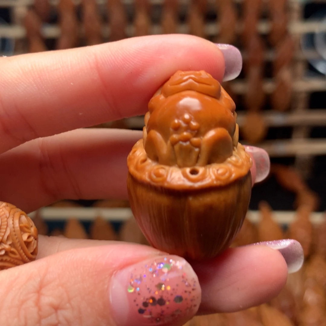 把件橄榄核躺平进财蛙