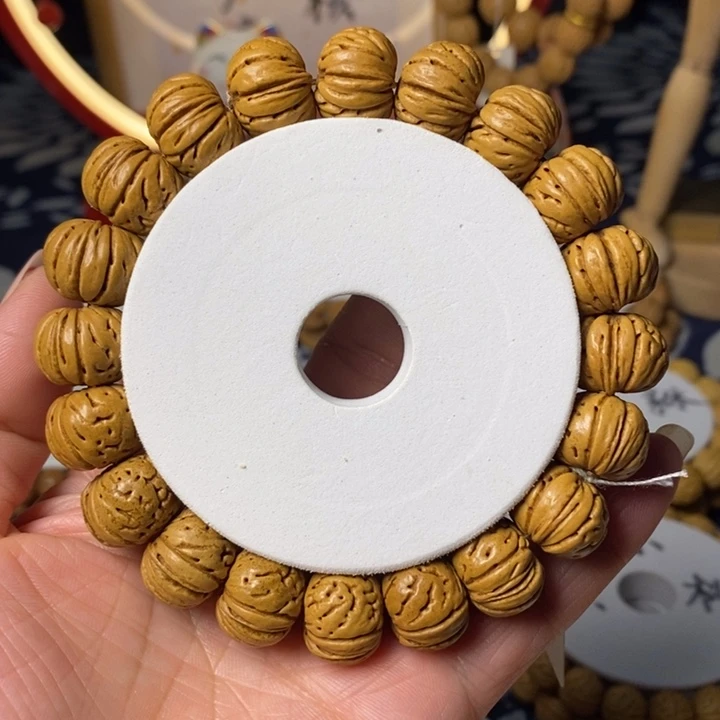 桃核手串管****鬼树王纽扣16