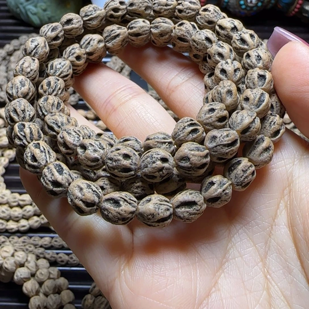 聽***遍柏香籽/百香籽吊坠