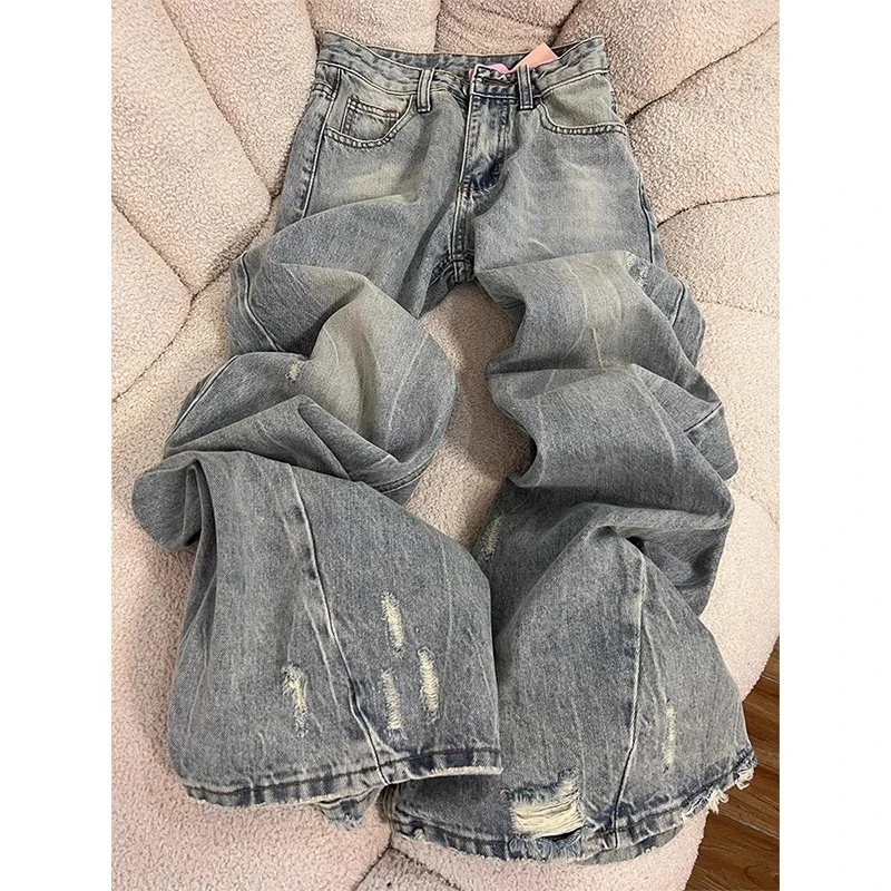 水洗浅蓝色破洞牛仔裤女夏季新款设计感高腰宽松显瘦直筒拖地裤子
