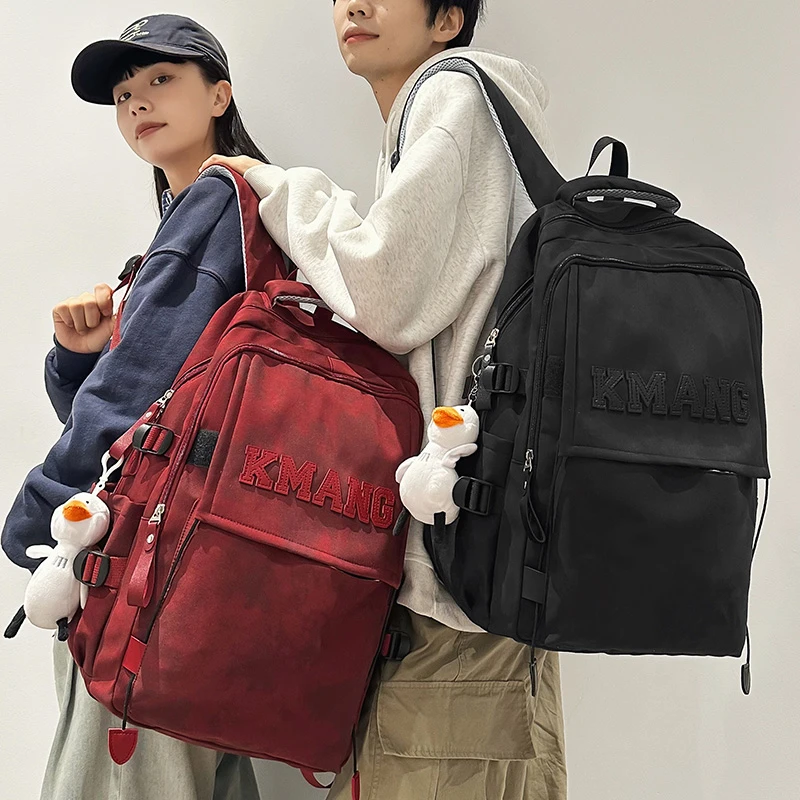 减负护脊宽背带书包女款初中生高中学生双肩包男士大学生旅行背包