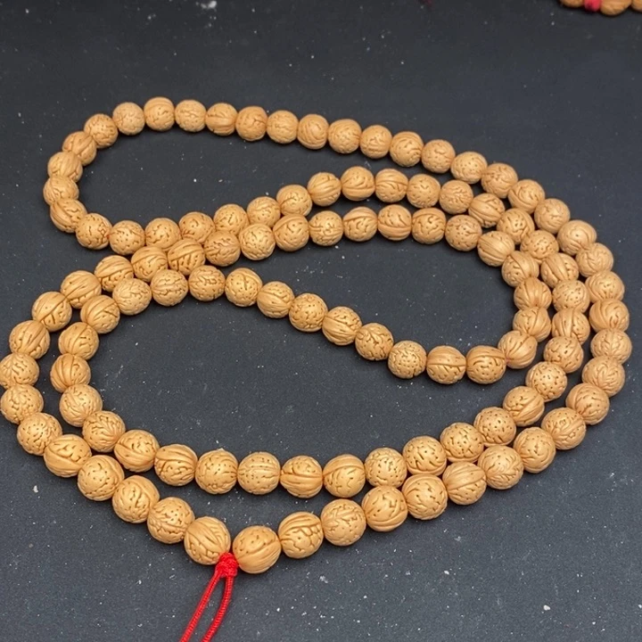 桃核手串脖挂11 110颗籽 抛光 误差0.5之间