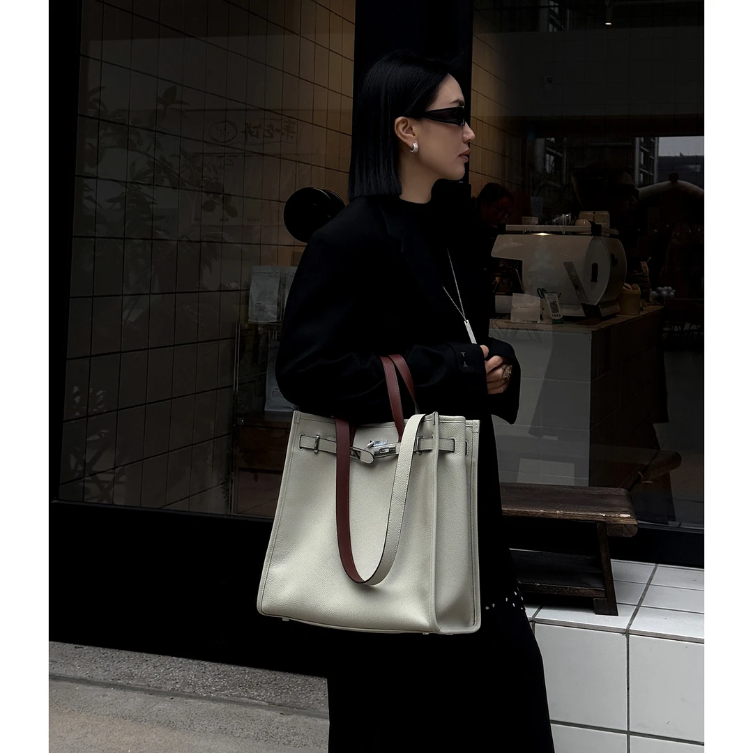 JISHE即奢粒面头层牛皮凯莉搭衣神器时尚单肩手提托特包AL3582