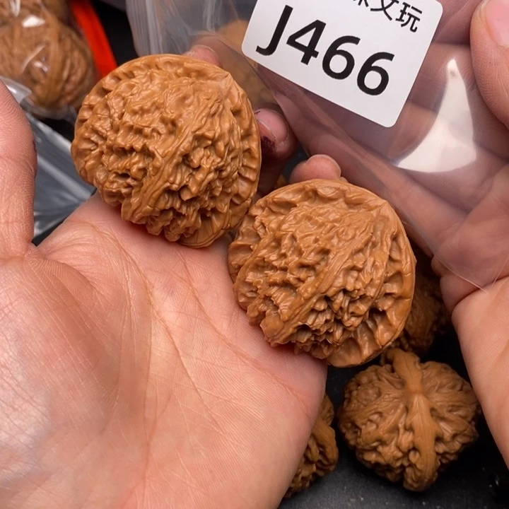 用***9桃核吊坠J466白狮子