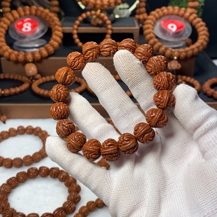 桃核吊坠阿****林秦岭龙纹