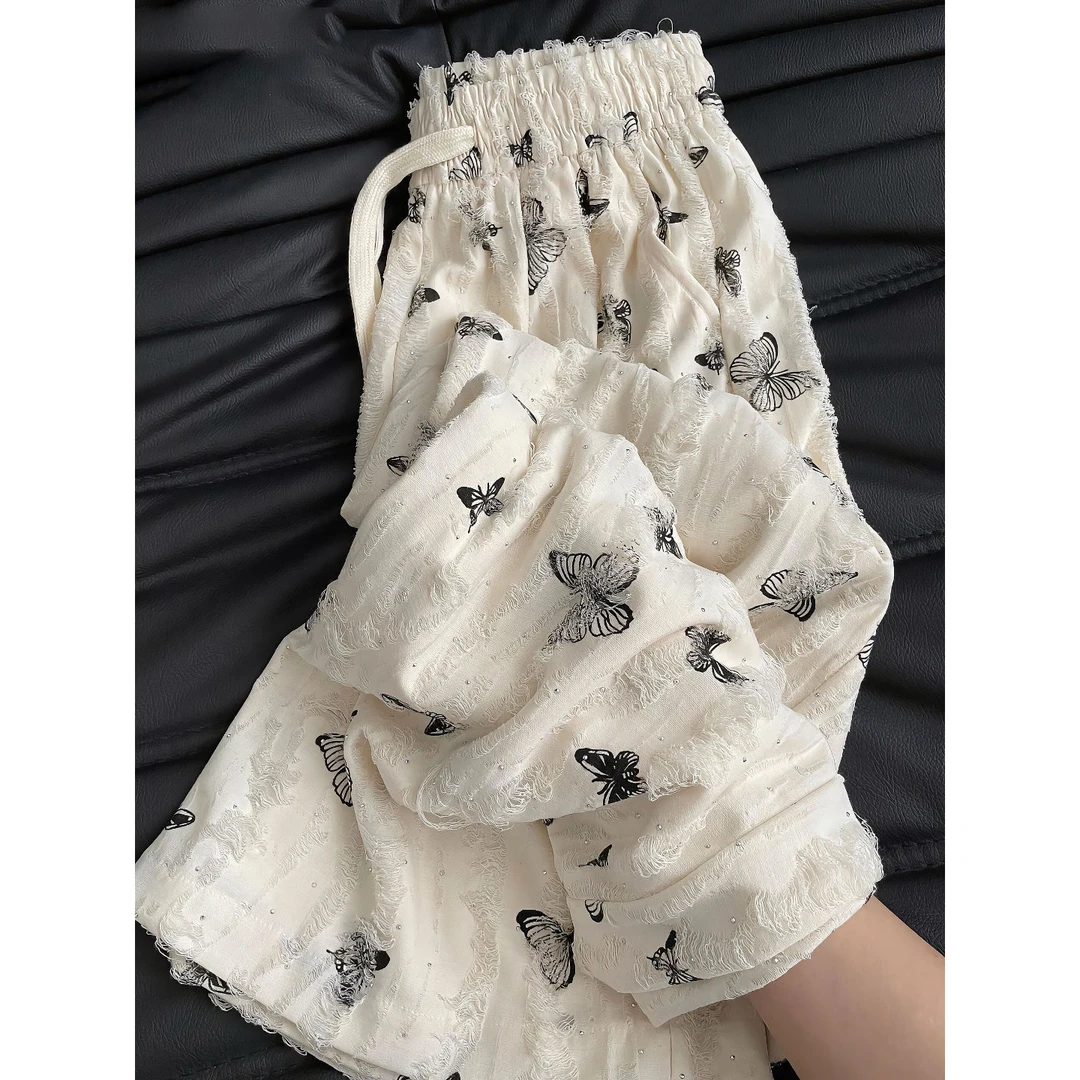 大码胖m300斤高腰印花休闲裤女春夏新款设计感垂感直筒慵懒阔腿裤