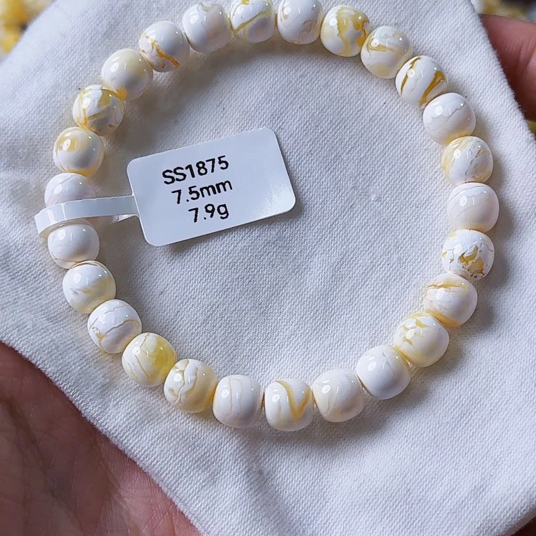 琥珀未镶嵌裸石7.5mm漆白闪电纹