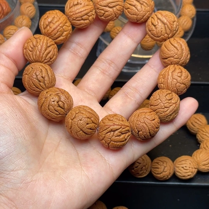 桃核手串金丝龙珠18