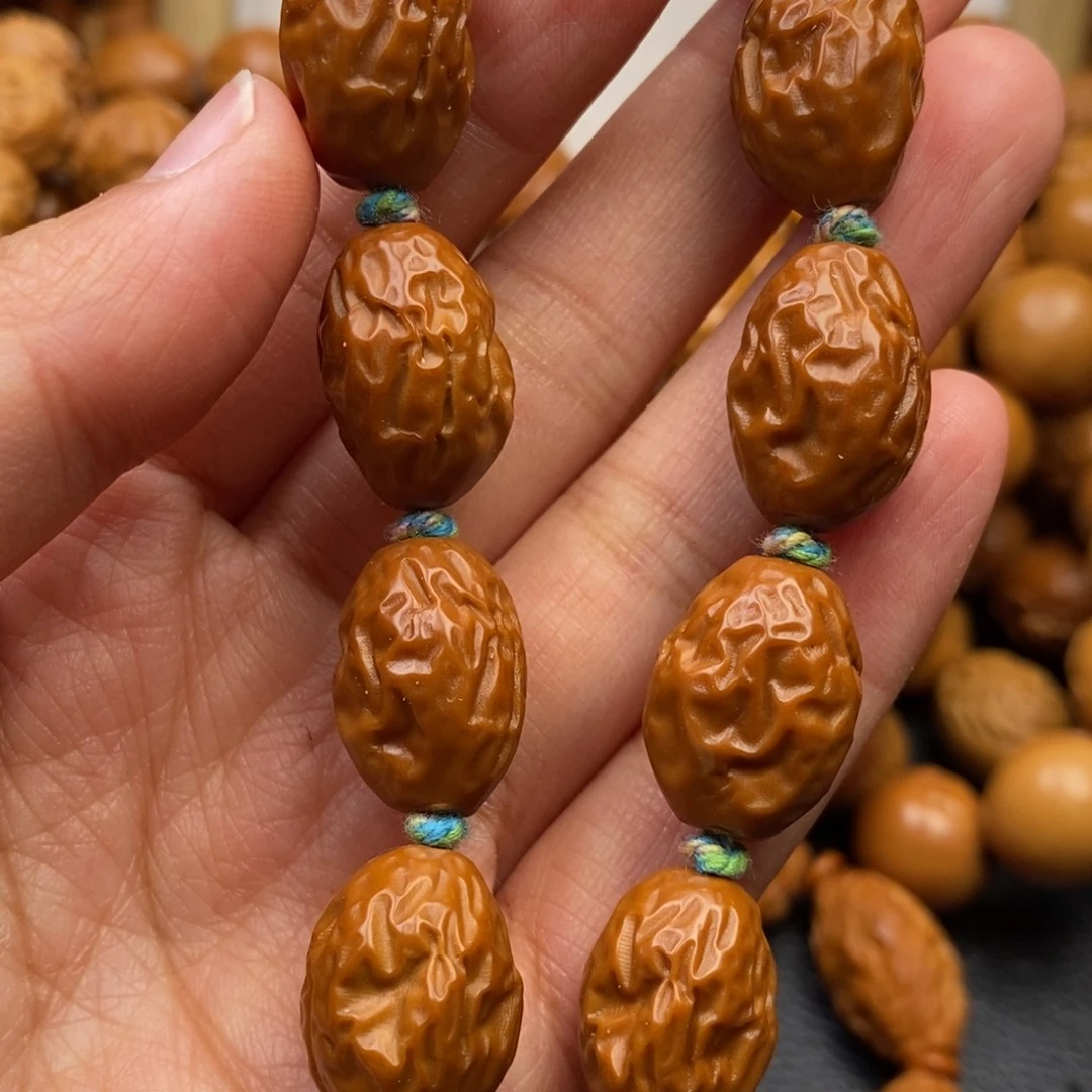 手串橄榄核红枣手串