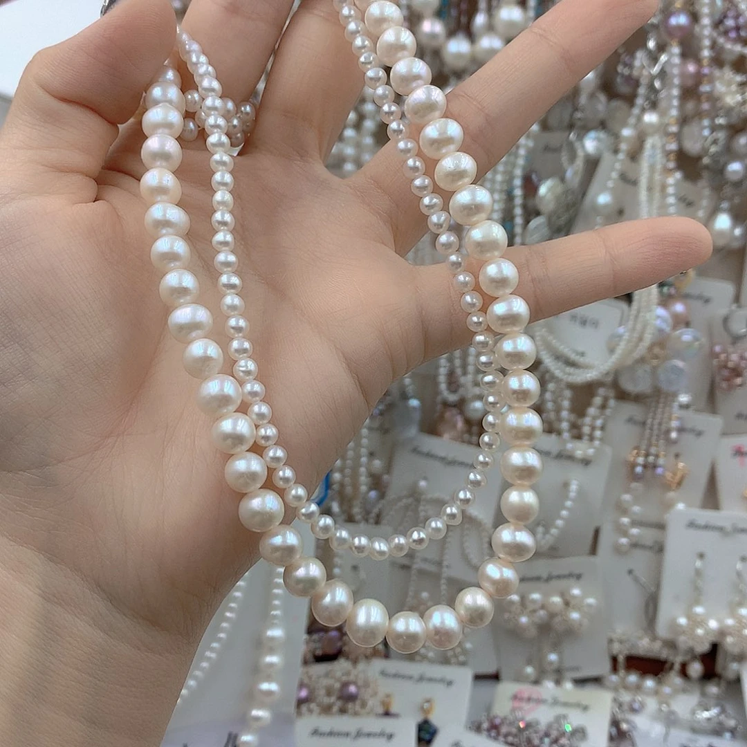 用***1银S925镶嵌淡水珍珠耳饰