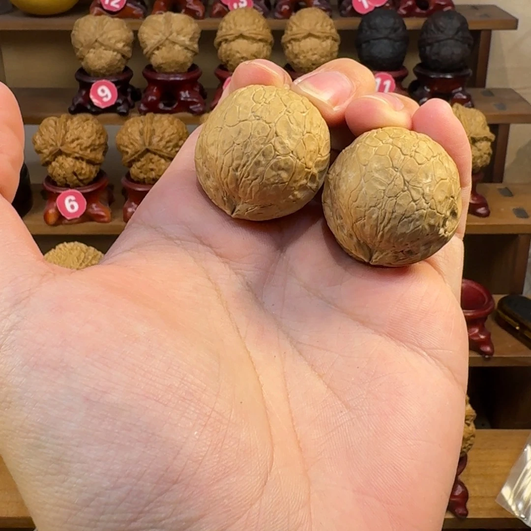 三***头铁核桃把件正圆蛇皮球